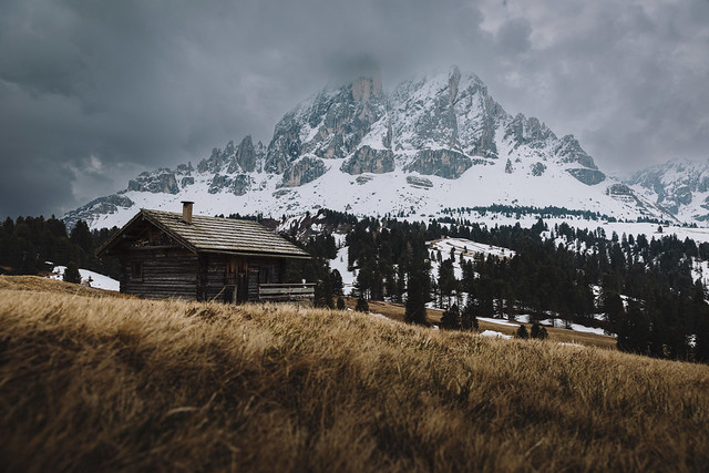 Cabin, mountain and clouds