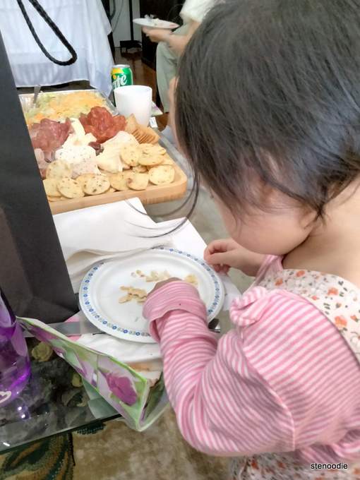  Toddler eating crackers