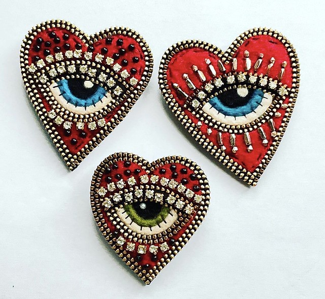 Heart with eye brooch.
