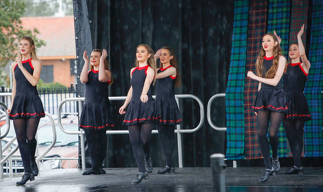 The Gathering of the Clan Festival 2022, Irish dancers on a wet stage in the rain.