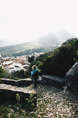 Gaucin by adam__r, Hazy sunset, looking over towards the town's mountain, 'El Hacho', from the steps of it's Moorish ca