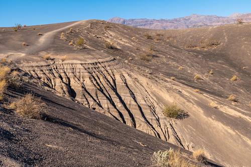 Walking along the rim of Ubehebe Crater, Death Valley National Park, California