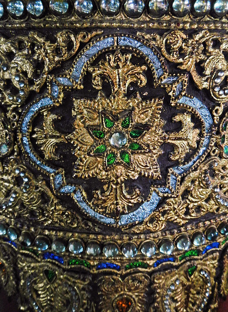 A detail of gold-leaf on a pillar in the in the Shwedagon temple in Yangon, Myanmar