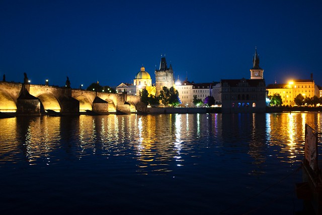 Night time reflections by Charles Bridge, Prague.