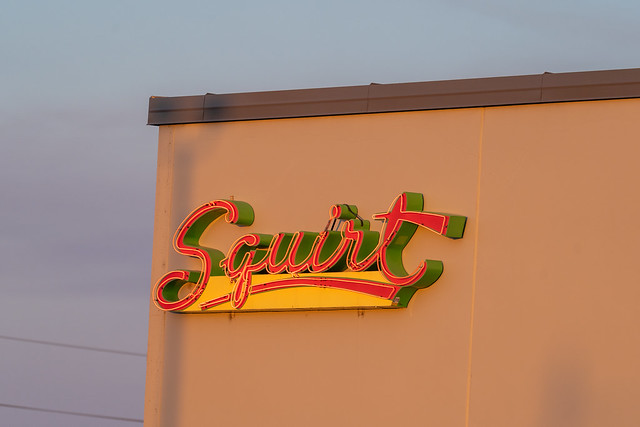 Yakima, Washington - July 6, 2021: An old fashioned retro Squirt neon sign on a building for Pepsi cola plant