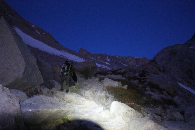 The faintest dawn alpenglow began to appear on the Sierra Crest as we kept hiking uphill on the Mount Whitney Trail