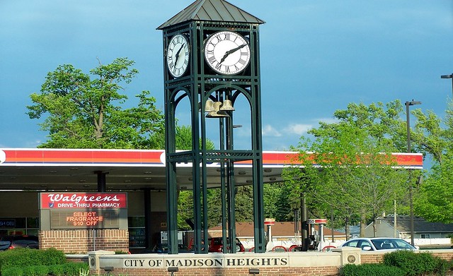 Clock Tower, Walgreens Pharmacy, and Exxon gas station at 9 minutes drive to the south of Madison Heights dentist Arts Dentistry Center