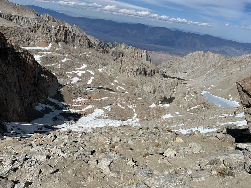 View east from Trail Crest on the Mount Whitney Trail, with frozen Consultation Lake on the right