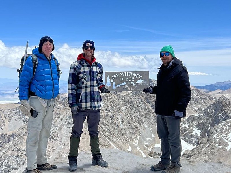 Me, my son, and my nephew posing on the Summit of Mount Whitney - we did it! Now all we need to do is get down!