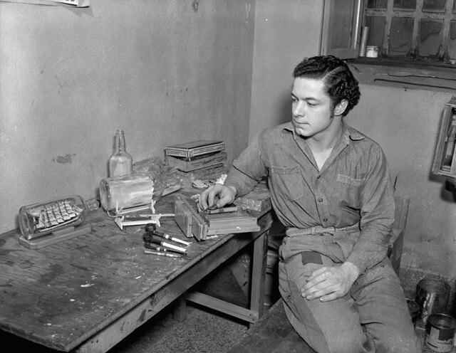 German prisoner of war working in model-making shop at Camp 32, Hull, Quebec / Prisonnier de guerre allemand travaillant dans un atelier de modélisme au camp 32, Hull (Québec)