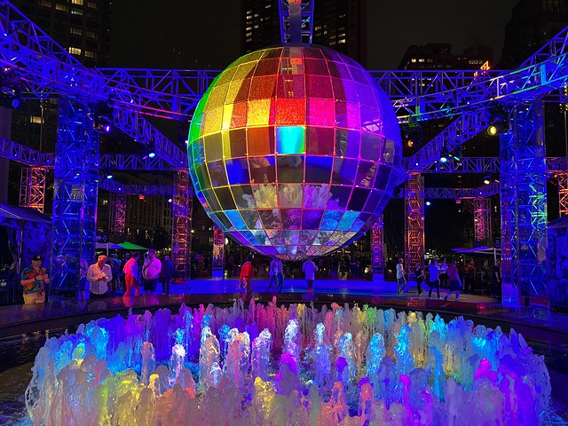 Lincoln Center for the Performing Arts water fountain with large disco mirror ball during Lincoln Center's Summer For The City dance and concert series in New York City USA June 23rd 2022