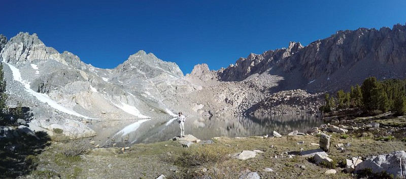 Wide-angle panorama shot of me standing in front of the high lake on the Golden Trout Lake North Spur Trail