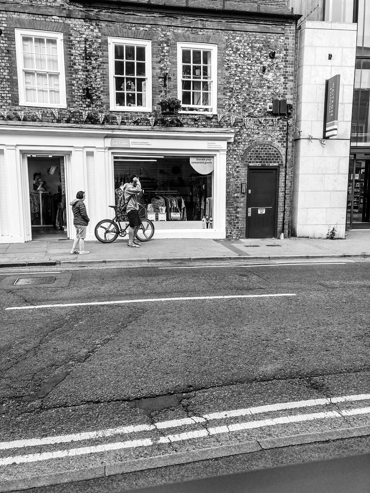 Cyclists from shop windows