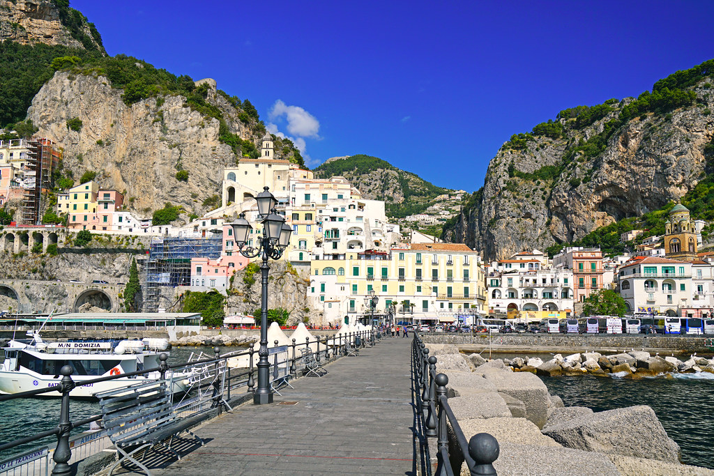 Walking along Amalfi pier, Italy
