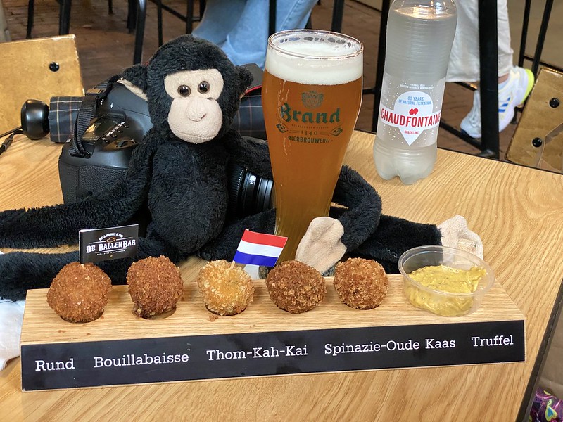 Monkey trying some Dutch bitterballen