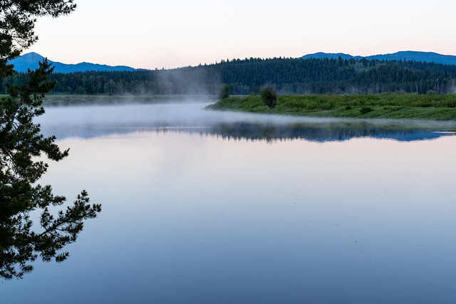 Early morning foggy steam sunrise on the Snake River at Oxbow Bend in Grand Teton National Park