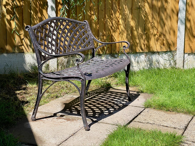 Garden bench in the sunshine