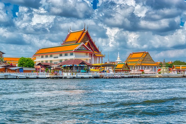 Wat Kalayanamit Woramahawihan by the Chao Phraya river in Bangkok, Thailand