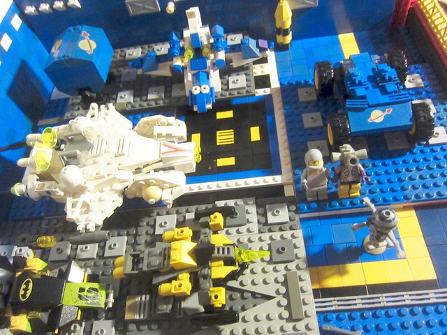 Classic Space: Miss Gray and her pregnant tri-phone Boyfriend in the sci-fi vehicle shop to buy a new drone and for another surprise (AFOL LEGO MOC with droid and minifigures vignette toy hobby)