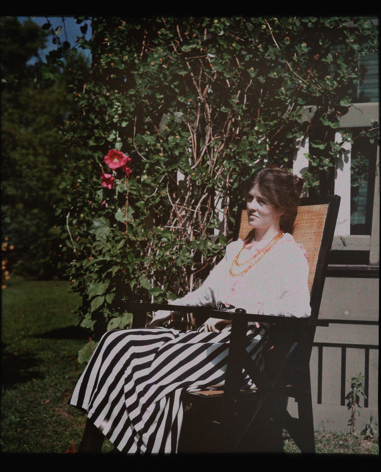 Laura Gilpin (1891-1979) :: [Woman in black and white striped skirt seated in chair], ca. 1910s. Autochrome. Amon Carter Museum
