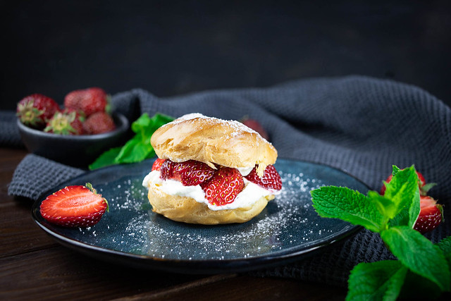 Cream puffs filled with strawberries