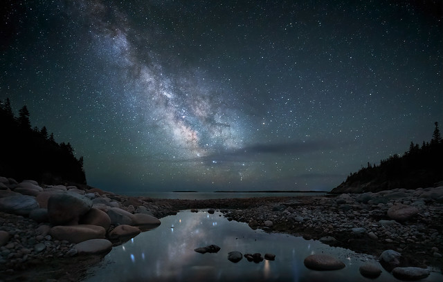 Reflection of stars and the Milky Way on the beach at Hunter's Beach, Acadia National Park, Maine