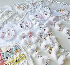 a table full of embroidery