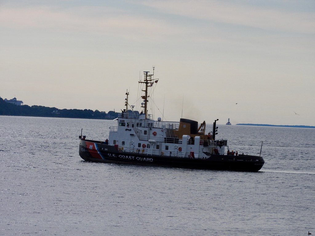 USCGC Biscayne Bay pulling away from St. Ignace, Michigan. Photo by howderfamily.com; (CC BY-NC-SA 2.0)