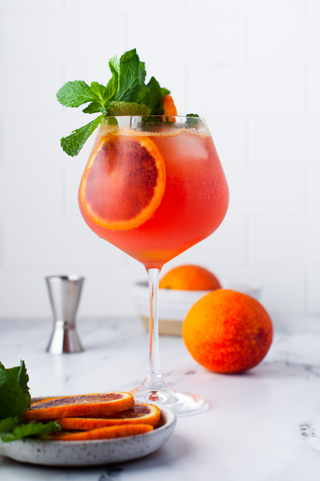 Blood Orange Mezcal Cocktail is a delicious bubbly drink made with smoky mezcal, bright blood orange juice, and tonic water. This is the perfect brunch cocktail!