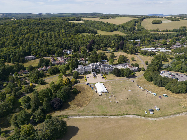 Aerial image: West Dean House - home of West Dean College of Arts & Conservation. The River Lavant is in the foreground