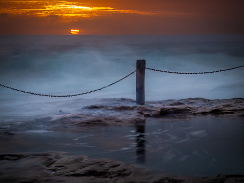 ivor rowe rock pool sea sunrise south coogee australia pacific ocean morning sun yellow clouds