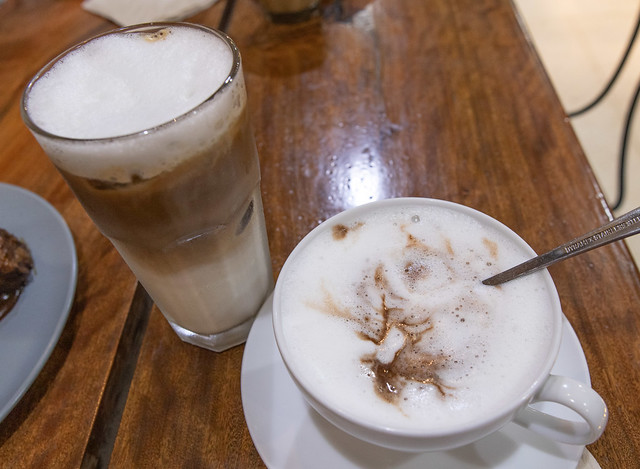 iced latte and champorado with milk foam