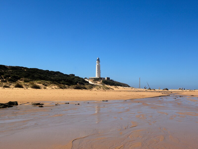 A photo from the beach towards the lighthouse of Traflagar. 