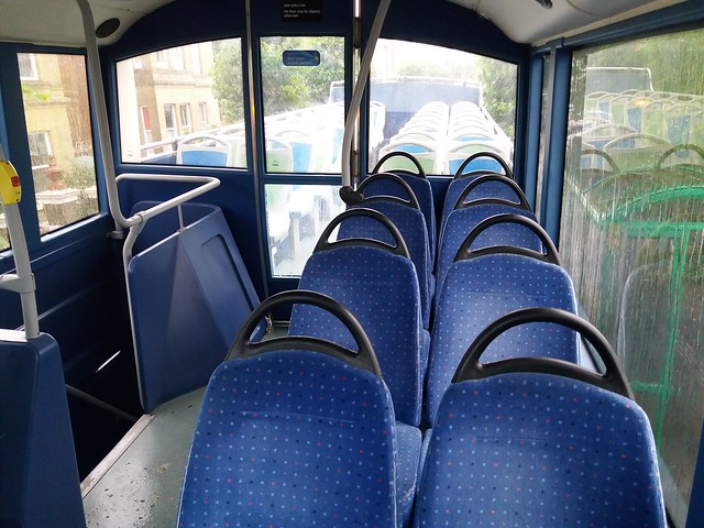 On a very wet Friday morning, I took refuge in the closed top deck section of Southern Vectis 1401 (HF09 FVU) a Scania N230UD Optare Visionaire new to Morebus for Purbeck Breezer services