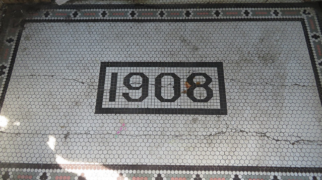 Dated Store Entrance Tiles