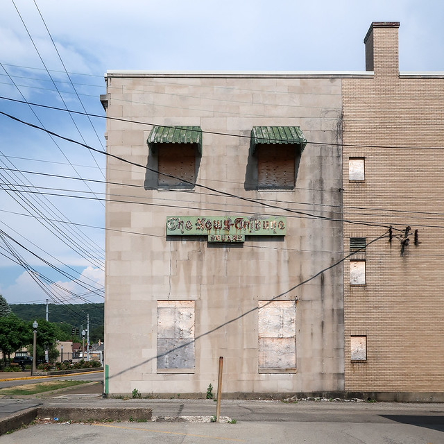 In Beaver Falls was a blighted newspaper building from 1929, with a ruined neon sign announcing 