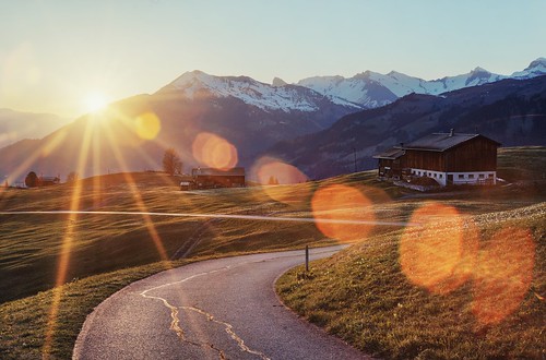 stels stelserberg schiers switzerland grison graubünden house barn road curve pasture grass alps swissalps mountain day sunset sun clear outdoor lensflare sunburst sony sonya7 a7 a7ii a7mii alpha7mii ilce7m2 fullframe vintagelens dreamlens canon50mmf095 canon 2xp raw photomatix hdr qualityhdr qualityhdrphotography fav200
