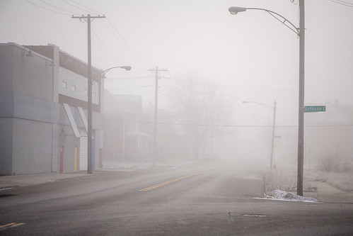 detroit michigan fog foggy morning abandoned urban decay sunrise downtown skyline church door doors industry industrial
