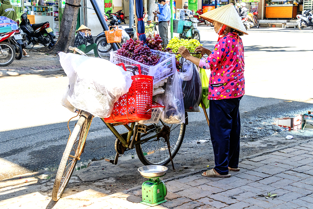 Older woman selling grapes on 7-29-22--Vung Tau copy