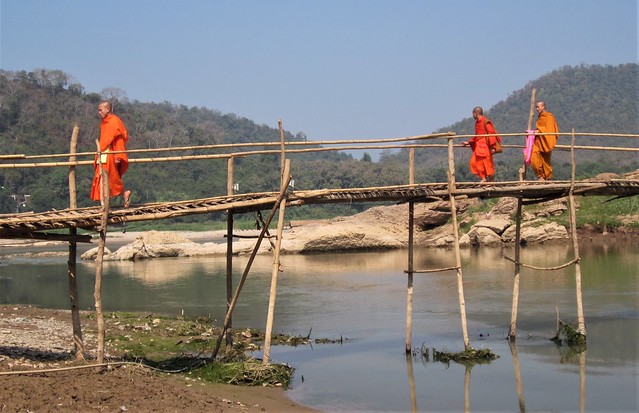 Monks crossing the Mekong