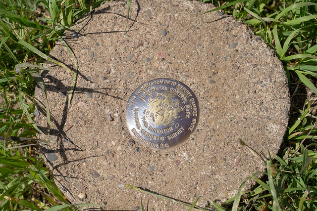 Geodedic survey marker for horizontal control mark, located in Red Wing Minnesota along the Barn Bluff trail