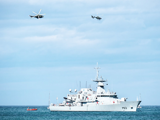 Irish Air Corps AW139 and EC135 behind LÉ William Butler Yeats