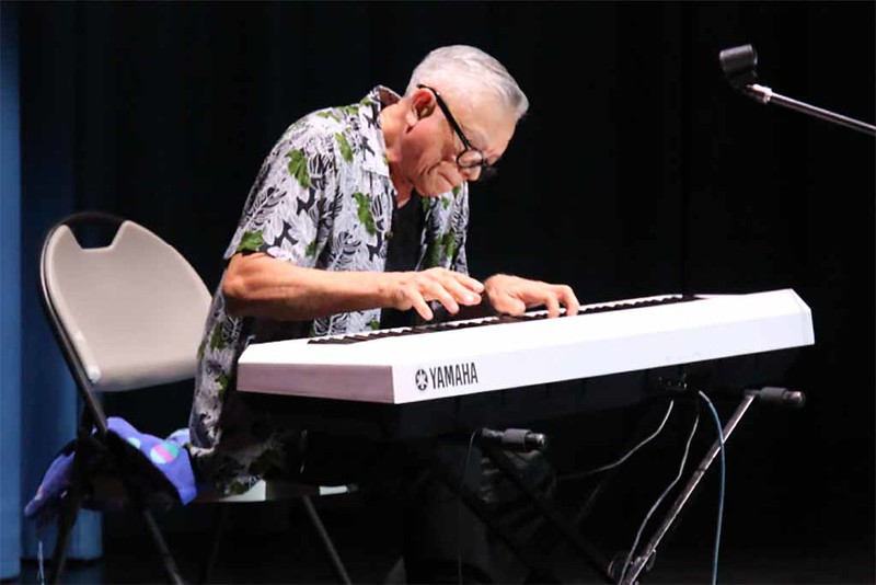 Fanohge CHamoru Exhibition Section 6: CHamoru Renaissance Music 1: Patrick Palomo. Jazz artist and composer Patrick Palomo performs onstage at the Guam Museum, February 2019. Photo by Dominica Tolentino