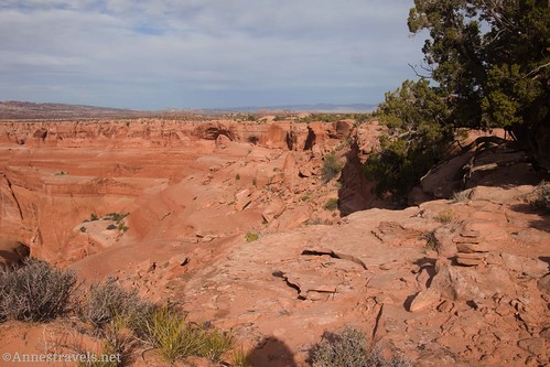 The beginning of the route down off of the cliff to get to Covert Arch above Lost Spring Canyon, Arches National Park, Utah