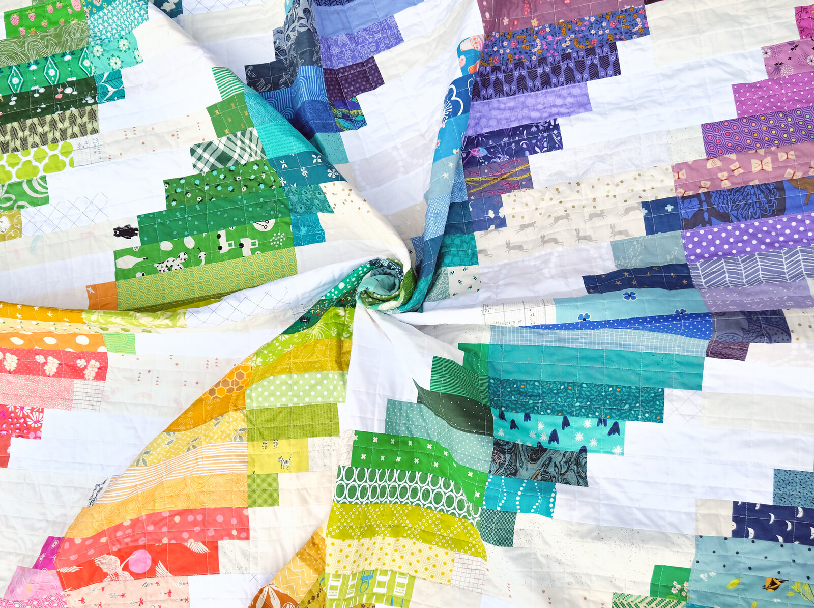 A Scrappy Rainbow Luna Quilt - Kitchen Table Quilting