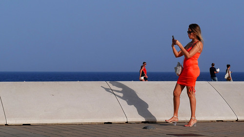 barcelona catalunya espana people red woman view terrace shadow light redskirt girl