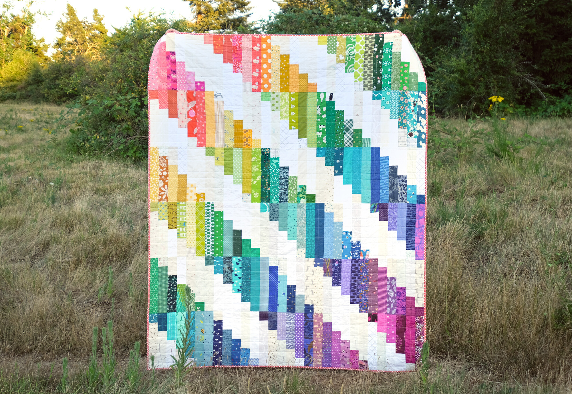 A Scrappy Rainbow Luna Quilt - Kitchen Table Quilting