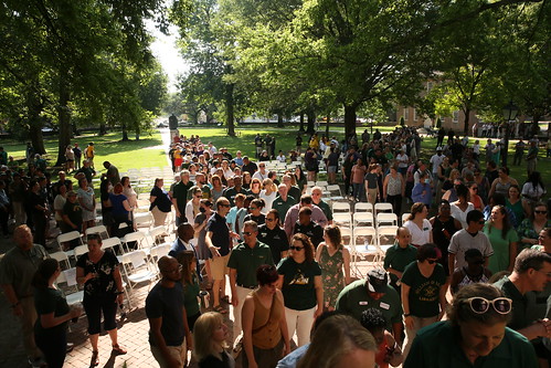 Faculty and staff of the university march through the Wren Building as part of the second annual Employee Convocation.