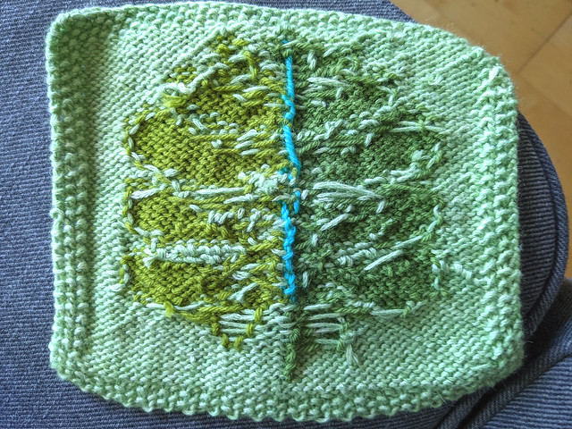 Wrong side of intarsia knitting with ends woven in