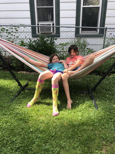 Zoe and Bell lounging on the hammock